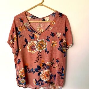 Kaileigh top size medium.  In very good condition-mauve pink with flowers